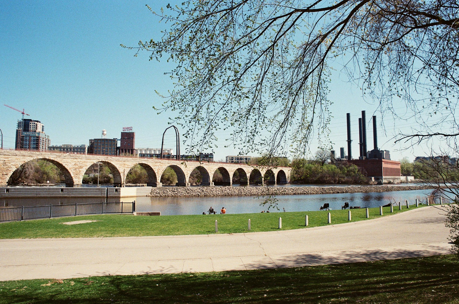 Stone Arch Bridge over the Mississippi at the Minneapolis mill district, the Minnesota market FinTruction serves with construction accounting
